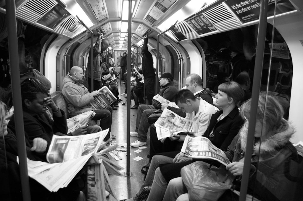 People sharing public space, illustrating how political news enters everyday life